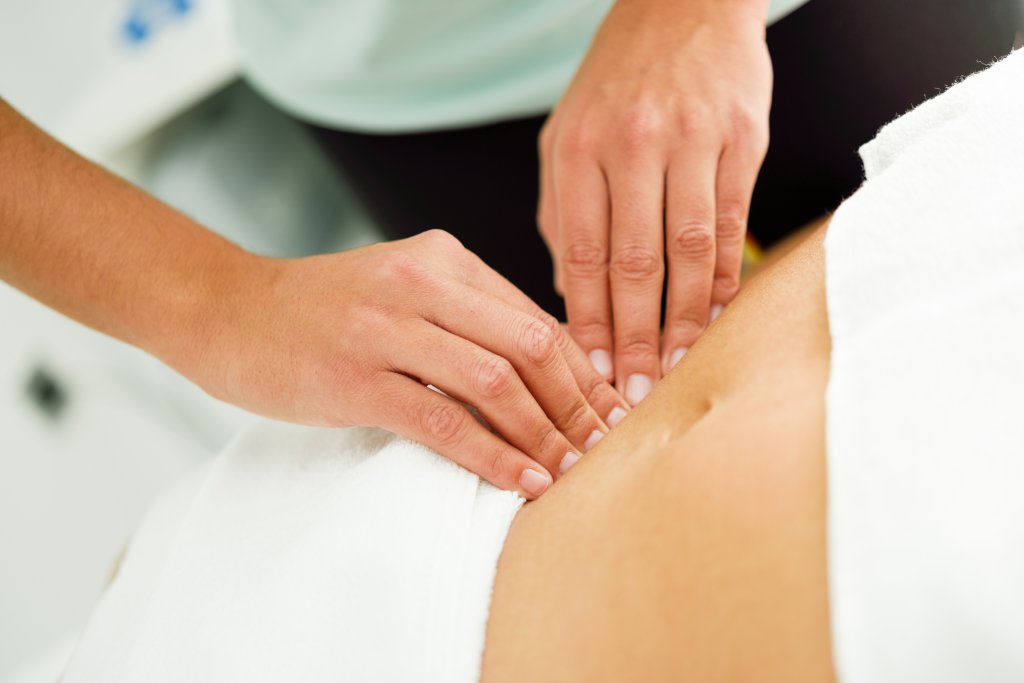 hands-massaging-female-abdomen-therapist-applying-pressure-on-belly.jpg hands-massaging-female-abdomen-therapist-applying-pressure-on-belly.jpg