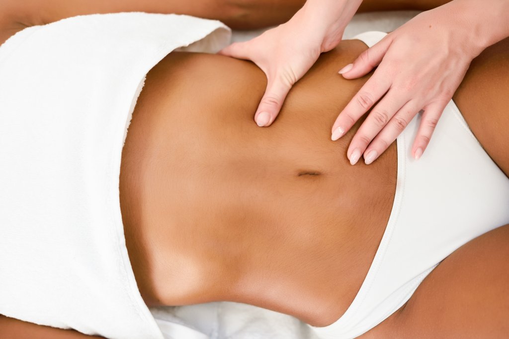 woman-receiving-abdomen-massage-in-spa-wellness-center.jpg woman-receiving-abdomen-massage-in-spa-wellness-center.jpg