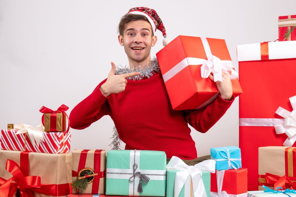 front-view-young-man-pointing-giftbox-sitting-around-xmas-gifts.jpg front-view-young-man-pointing-giftbox-sitting-around-xmas-gifts.jpg